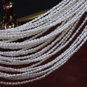 2-2.5mm Threaded Rice Freshwater Pearls