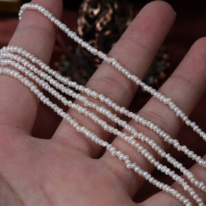 2 mm große, hochglänzende, unregelmäßige Baby-Keshi-Süßwasserperlen