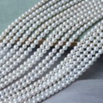 4.5-5mm-Round-Nucleated-Natural-Freshwater-Pearl-Necklace-Loose-Beads-Show-On-Hand