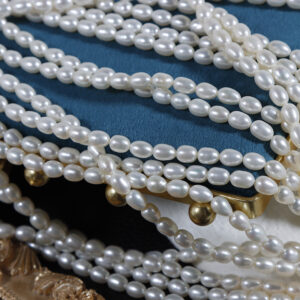 4,5-5 mm starke, glänzende Reiskornkette aus natürlichen Süßwasserperlen