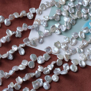 5-6 mm silberne, kernfreie Keshi-Süßwasserperlen in Blütenblattform
