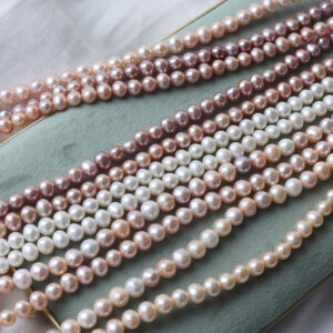 Hilo de perlas de agua dulce ovaladas sin núcleo de 7 mm, 40-41 cm