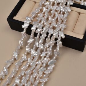 Perlas de agua dulce barrocas con cruz de agujero diagonal