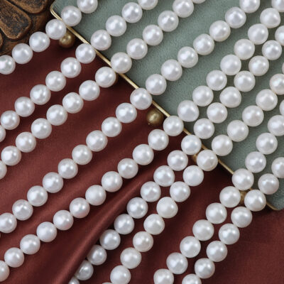 5A Kernfreie, 9 mm große, nahezu runde, natürliche Süßwasserperlen