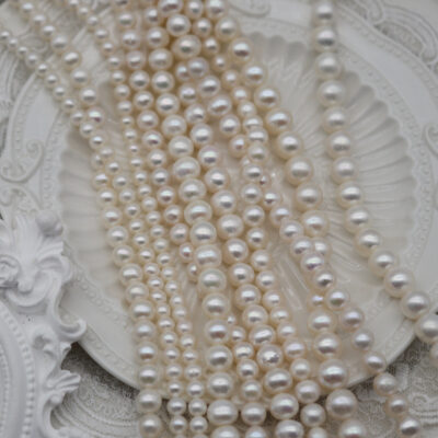 Perlas de agua dulce naturales ovaladas brillantes de 5-9 mm