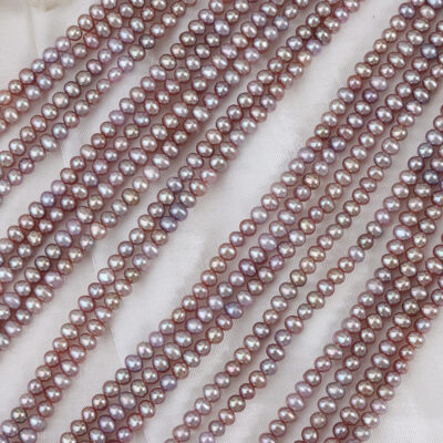 3-4 mm große, glatte, ovale, violette Süßwasserperlen