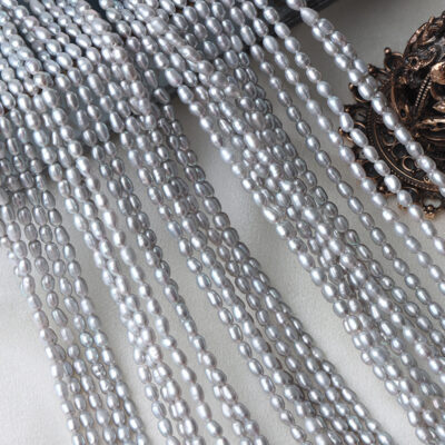 Perlas de agua dulce de arroz gris teñidas e irradiadas de 3 mm