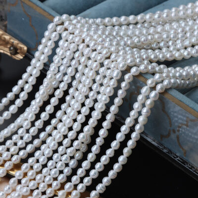 Perlas de agua dulce ovaladas enhebradas naturales de 3 mm