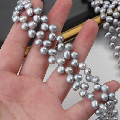 Perlas de agua dulce de grano de arroz gris irradiado natural de 5-6 mm