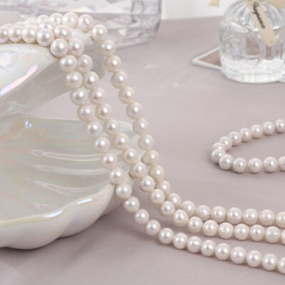 Perles d'eau douce rondes naturelles de haute qualité de 10 à 11 mm B