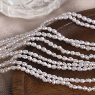 Perlas de agua dulce de arroz de forma libre, de color blanco brillante, de 2 a 3 mm