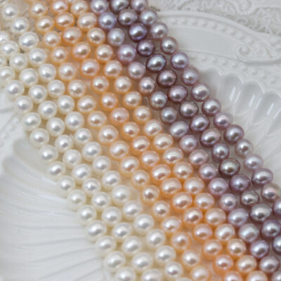 6-7 mm große, naturfarbene, gebohrte ovale Süßwasserperlen