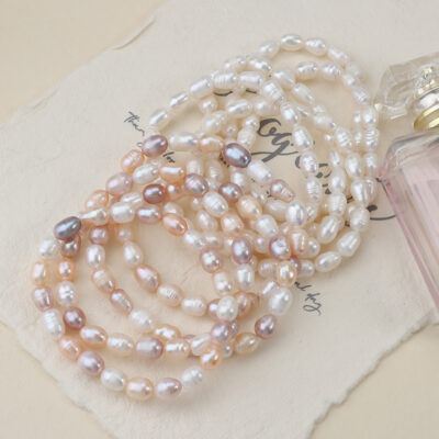 Pulsera elástica de arroz con perlas de agua dulce genuinas (ver detalles)