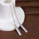 Pendientes de perla barroca con cadena de caja chapada en oro S925 (detalles)
