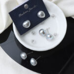 Pendientes de plata de ley 925 con perla barroca gris. Detalles.