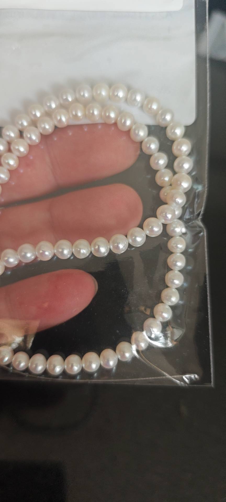 Revue photo des perles d'eau douce naturelles rondes sans noyau de 5 à 5,5 mm