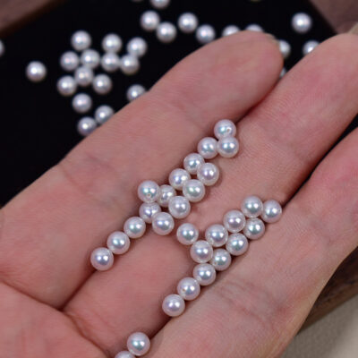 10 perles d'eau douce rondes blanches irisées de 3 à 4 mm