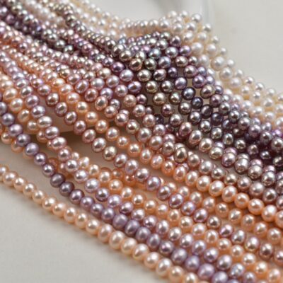 Perlas de agua dulce naturales ovaladas de color púrpura de alto brillo de 6-7 mm