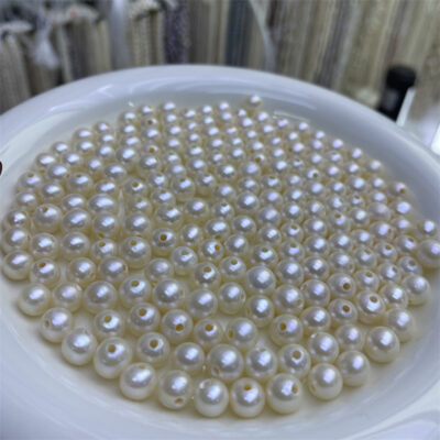 Perles naturelles rondes blanches à grand trou de 6 à 7 mm