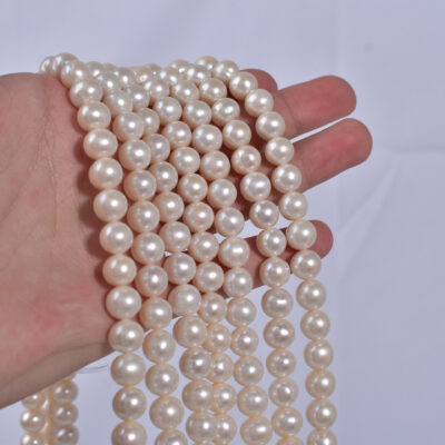 9-10 mm große, runde, natürliche Süßwasserperlen im Rosenstil