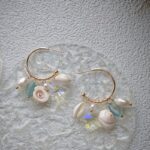 Boucles d'oreilles en argent 925, perles d'eau douce et étoiles de mer : détails à découvrir