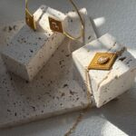 Collier de perles œil-grec avec pendentif en argent plaqué or à montrer au poignet