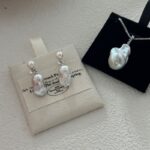 Mini-Pearl-and-Baroque-Freshwater-Pearl-Drop-Earrings-Over-Show