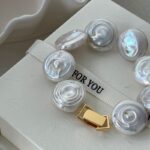 Roman-Holiday-Flat-Coin-Pearl-Bracelet-Over-Show