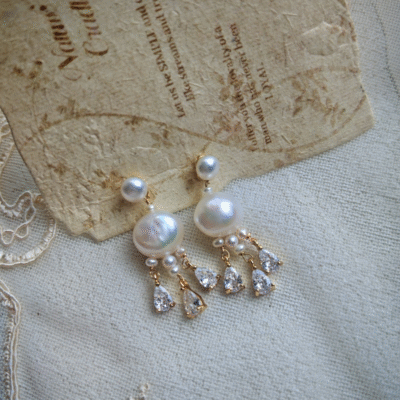 Boucles d'oreilles à pompons en argent 925 et perles d'eau douce