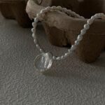 Detalles del collar de perlas de agua dulce con pétalos de plata 925