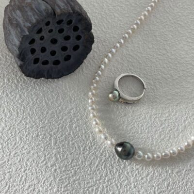 Bague ajustable en argent avec perle ronde d'eau de mer