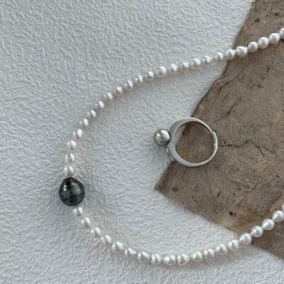 Bague ajustable en argent avec perle de mer ronde