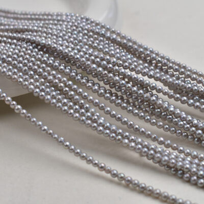 Perlas de agua dulce naturales microgrises casi redondas de 2-3 mm