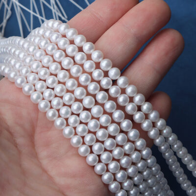 Fil rond blanc brillant de 5 à 5,5 mm, avec de légers défauts