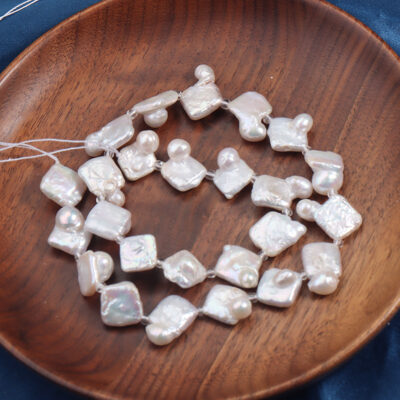 Natürliche, pralle, unregelmäßige Süßwasserperlen im Barockstil