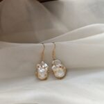 Gold-Wire-Wrapped-Baroque-Pearl-Dangle-Earrings-Over-Details