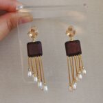Detalles de los pendientes de plata S925 con citrino, madera y borla de perlas.