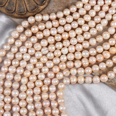 Perles d'eau douce naturelles couleur pêche-orange de 10 mm