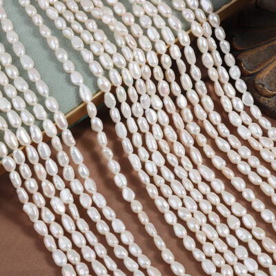 Perles d'eau douce blanches naturelles à dos plat, longues, de 4,5 à 5 mm