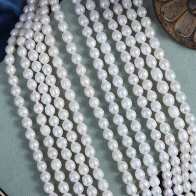 Hilo de perlas barrocas blancas de agua dulce de alta calidad de 7 mm