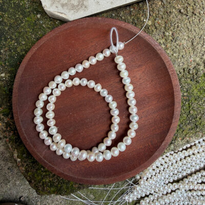 5.5-6mm White Good Luster Oval Freshwater Pearls