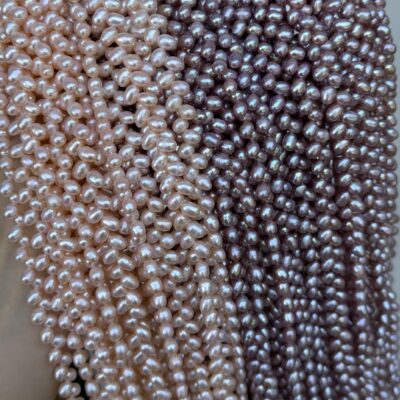 Perla natural de agua dulce de 5 mm con patrón de espiga de trigo perforado en diagonal.