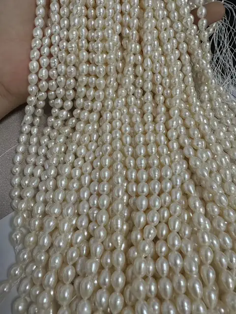 Revue photo des perles d'eau douce naturelles de riz à haute brillance de 5 à 6 mm
