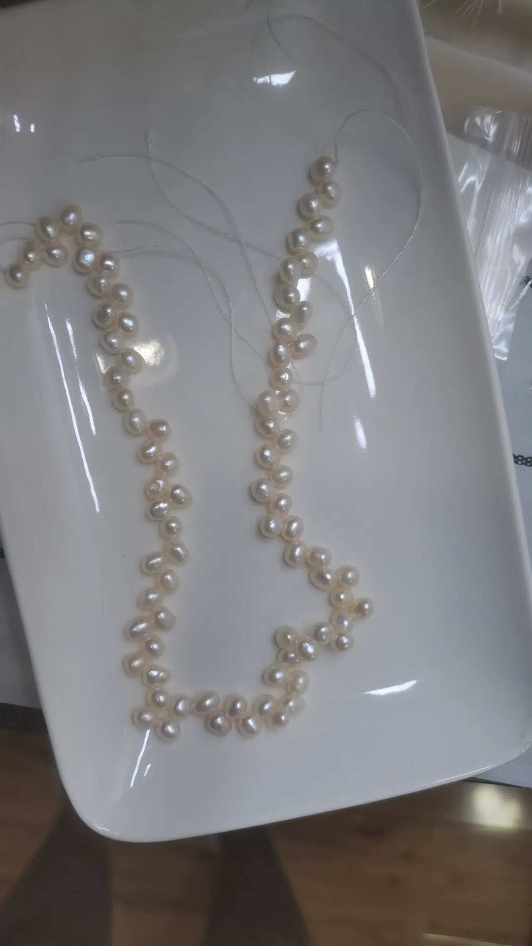 Revue photo des perles d'eau douce naturelles non nucléées en épi de blé de 5 à 6 mm