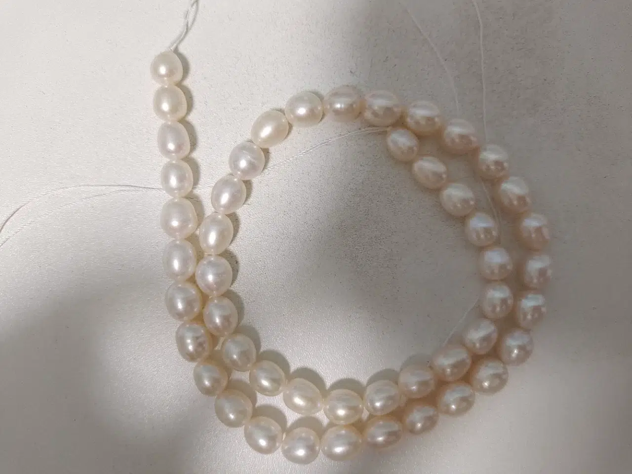 Revue photo des perles d'eau douce naturelles Strong Luster de 7 mm