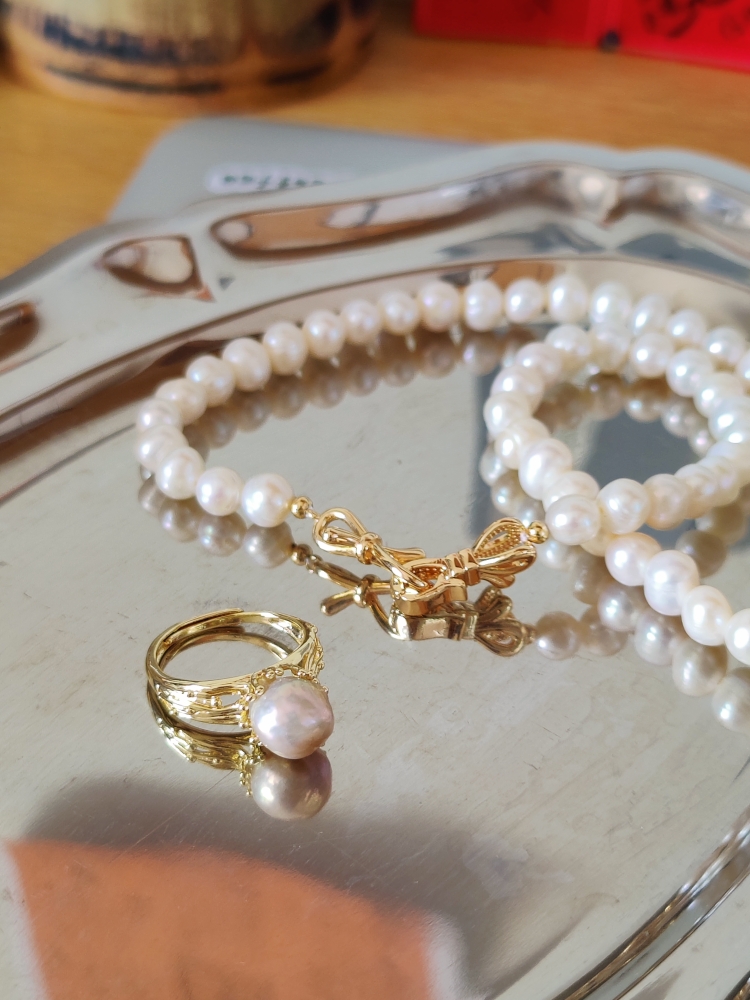 Fotorezension eines Süßwasserperlen-Chokers mit goldenem Clipverschluss