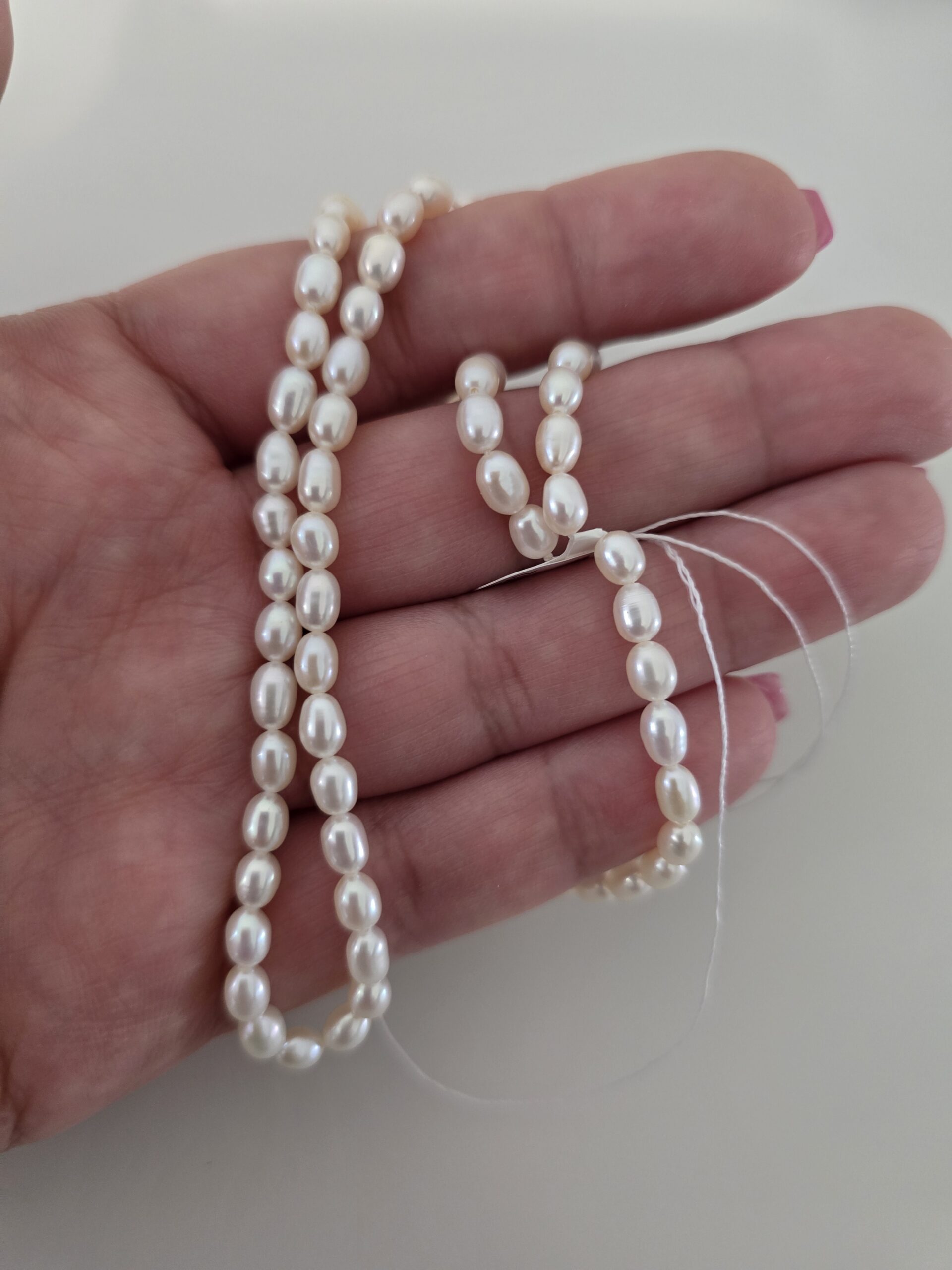 2-9mm Strong Luster Natural Rice Shaped Freshwater Pearls photo review